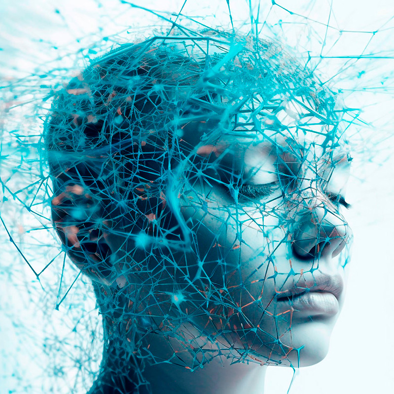 Rostro azulado realizado con Inteligencia Artificial con una malla 3D rodeándolo